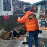Tanah longsor di salah satu pemukiman.