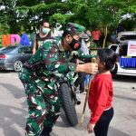 Laksanakan Instruksi Presiden, Korem 091/ASN Tebar Masker Gratis