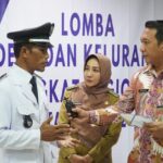Tonjolkan SIDT dan Pengelolaan PAK, Bupati Dampingi Kakam Sumber Agung Presentasi Lomba Desa Tingkat Regional III