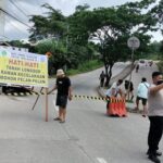 Retakan Jalan Makin Parah, Akses Jalur Teluk Bajau Ditutup